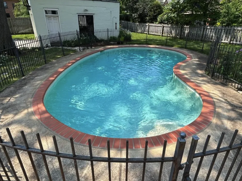 St. Louis pool deck with dingy gray concrete before cleaning