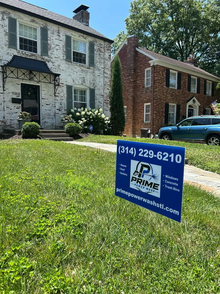 Prime Power Wash yard sign on a freshly cleaned St. Louis property